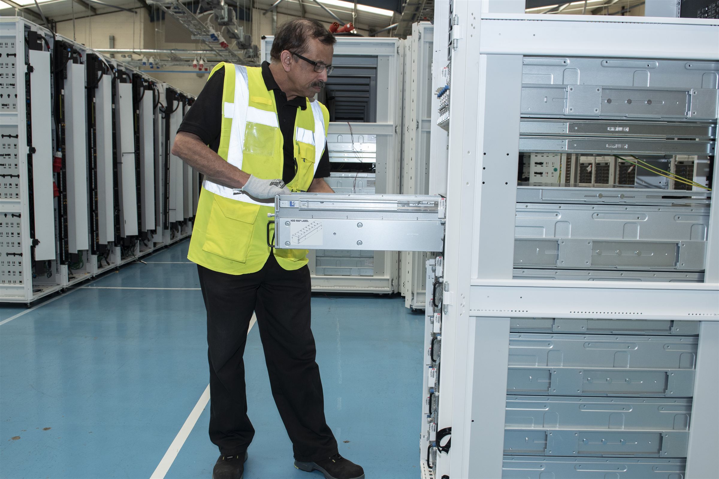Arvato Ireland technician integrating server hardware at the Swords facility