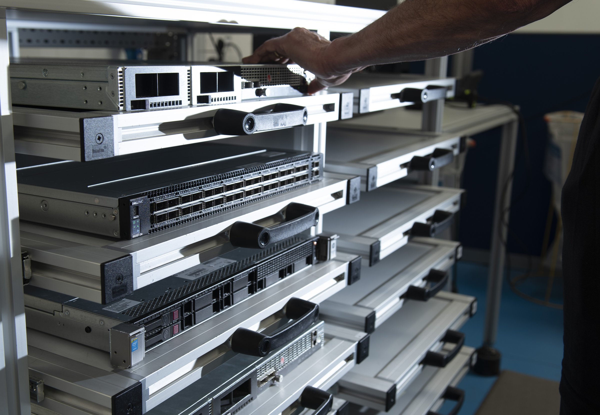 A server being placed onto an integration trolley shelf